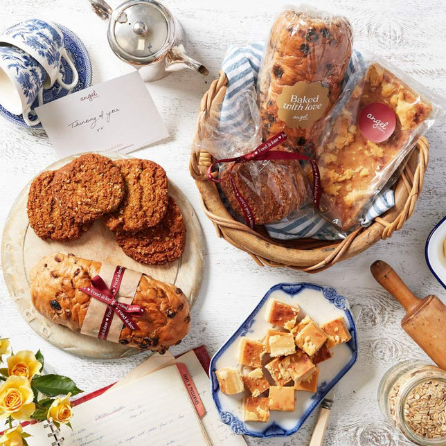 Baked gift hamper with fruit loaf, cookies and slice