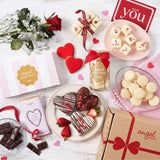 Valentine’s hamper with heart-shaped chocolates, cookies, fudge, roses, and a “Just for You” card.